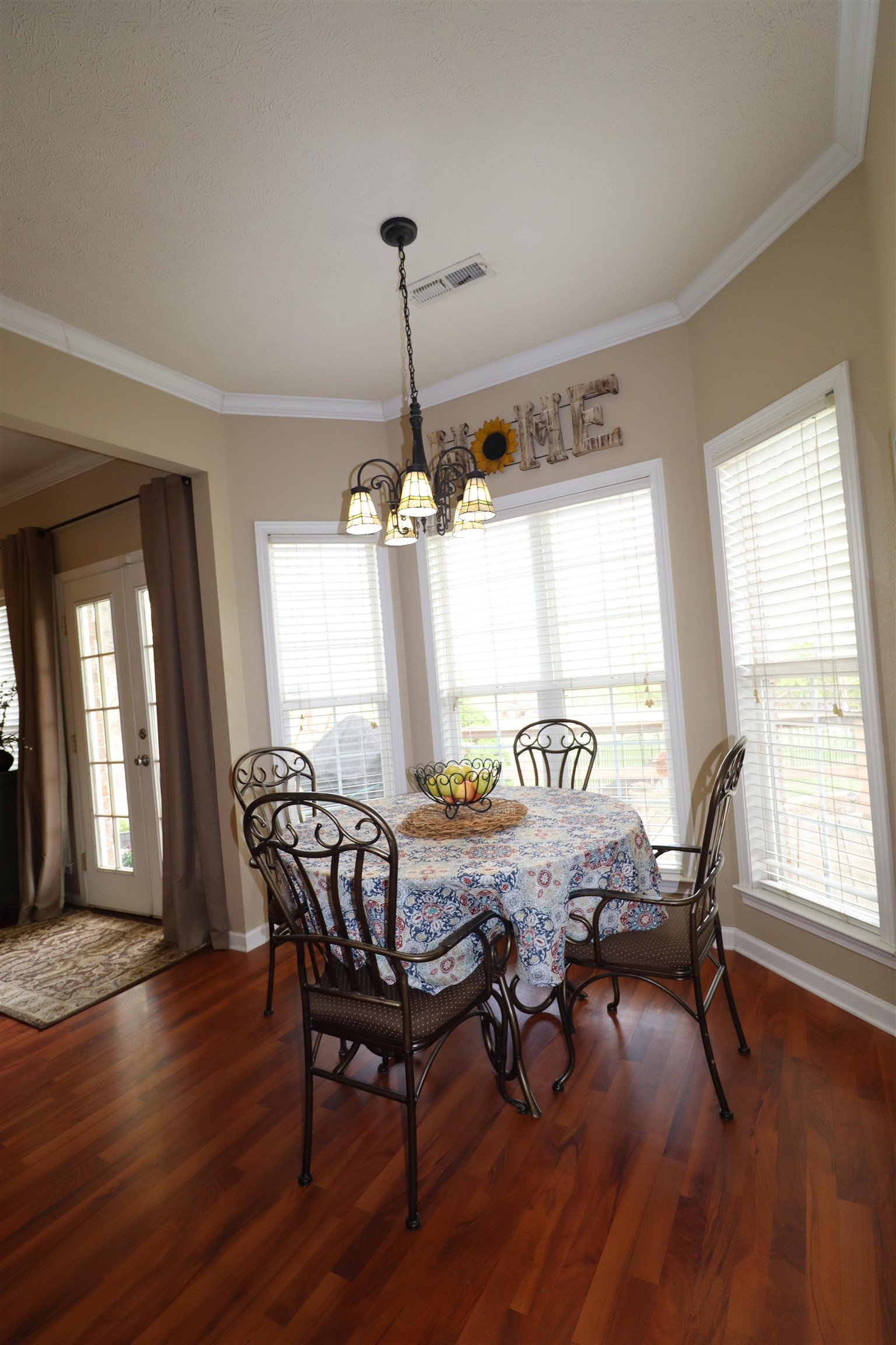 730 Durhamville Road Ripley, TN 38063 - Photo 17 of 40 a view of a dining room with furniture window and wooden floor