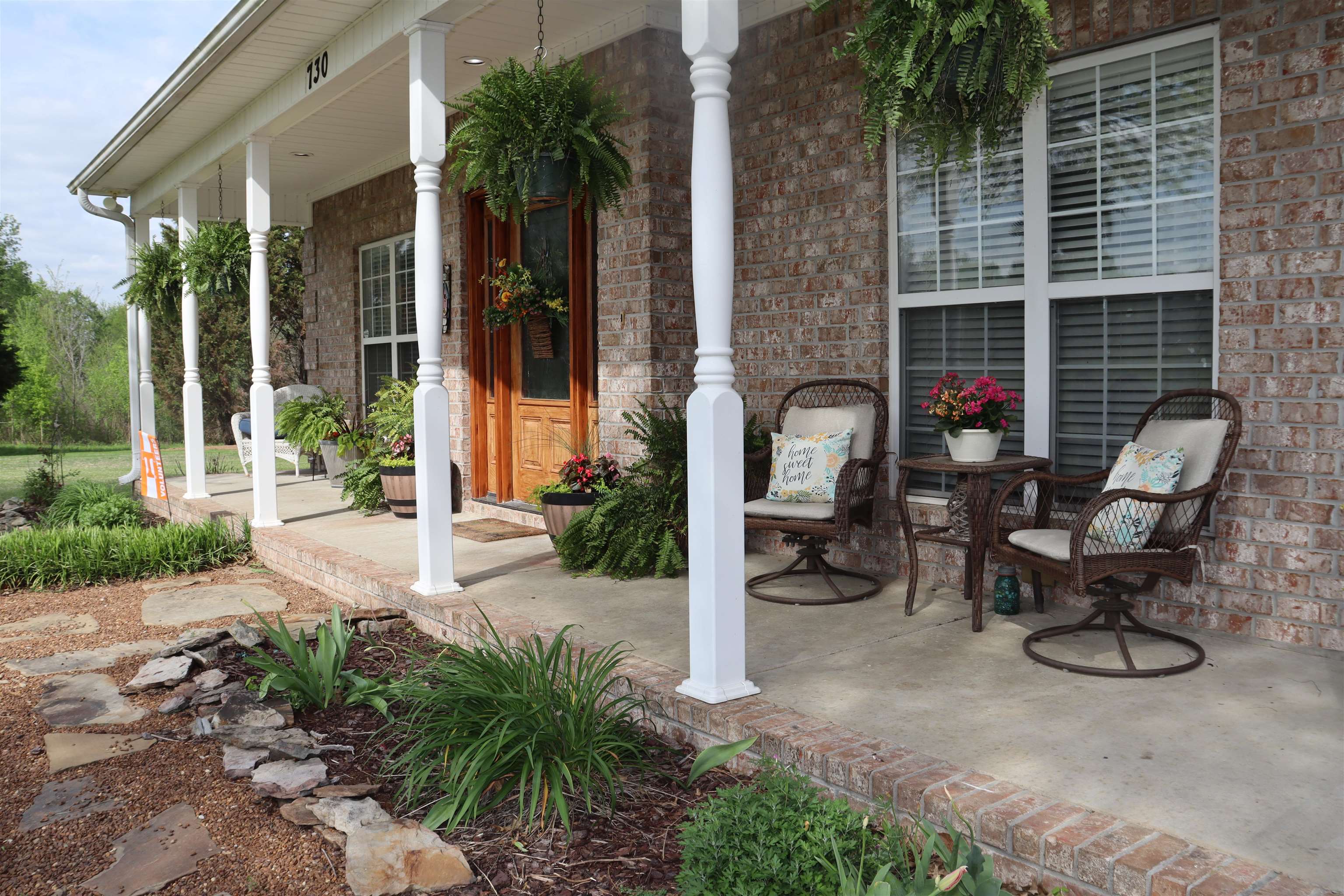 730 Durhamville Road Ripley, TN 38063 - Photo 2 of 40 a backyard of a house with yard and outdoor seating