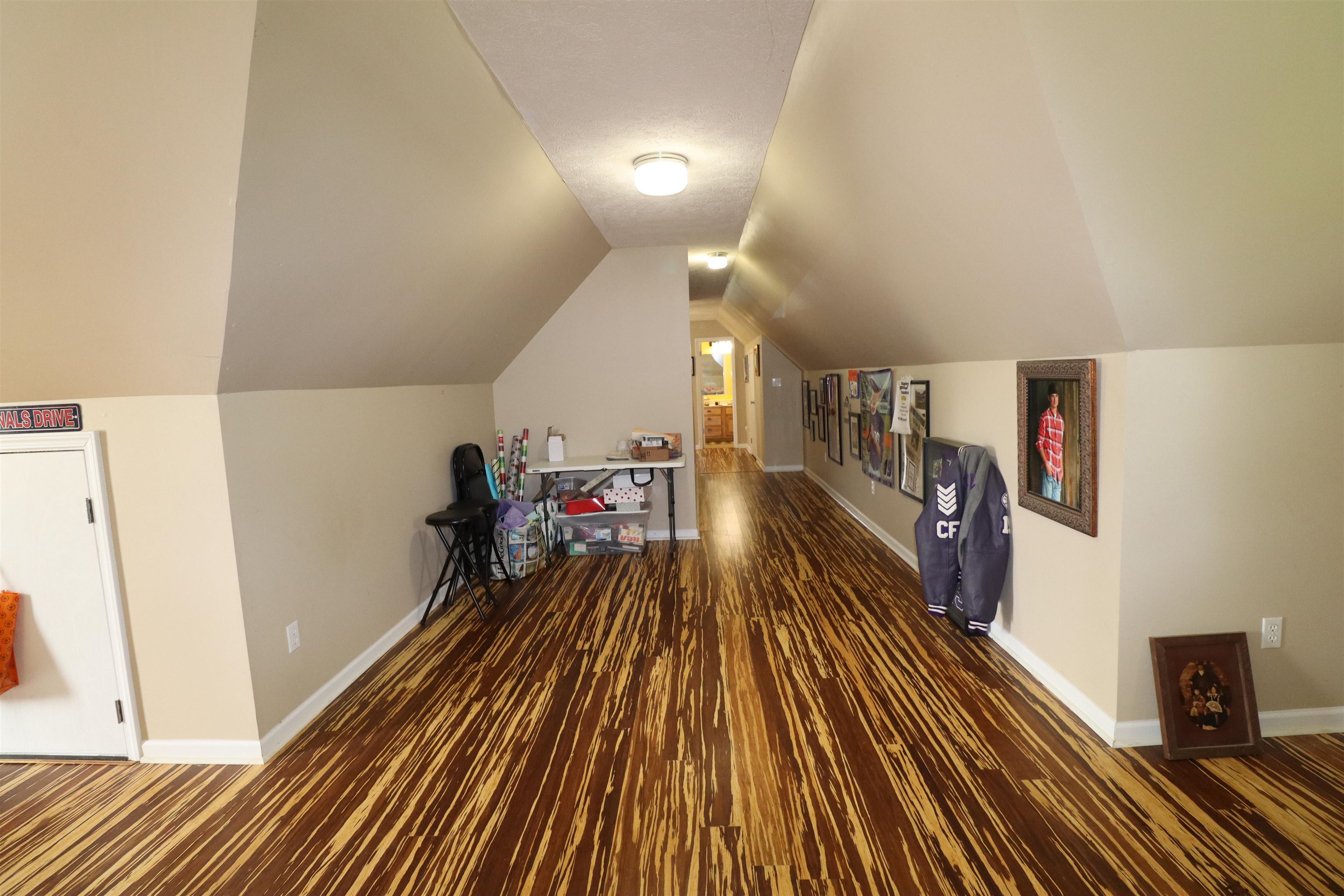 730 Durhamville Road Ripley, TN 38063 - Photo 28 of 40 a hallway with wooden floor