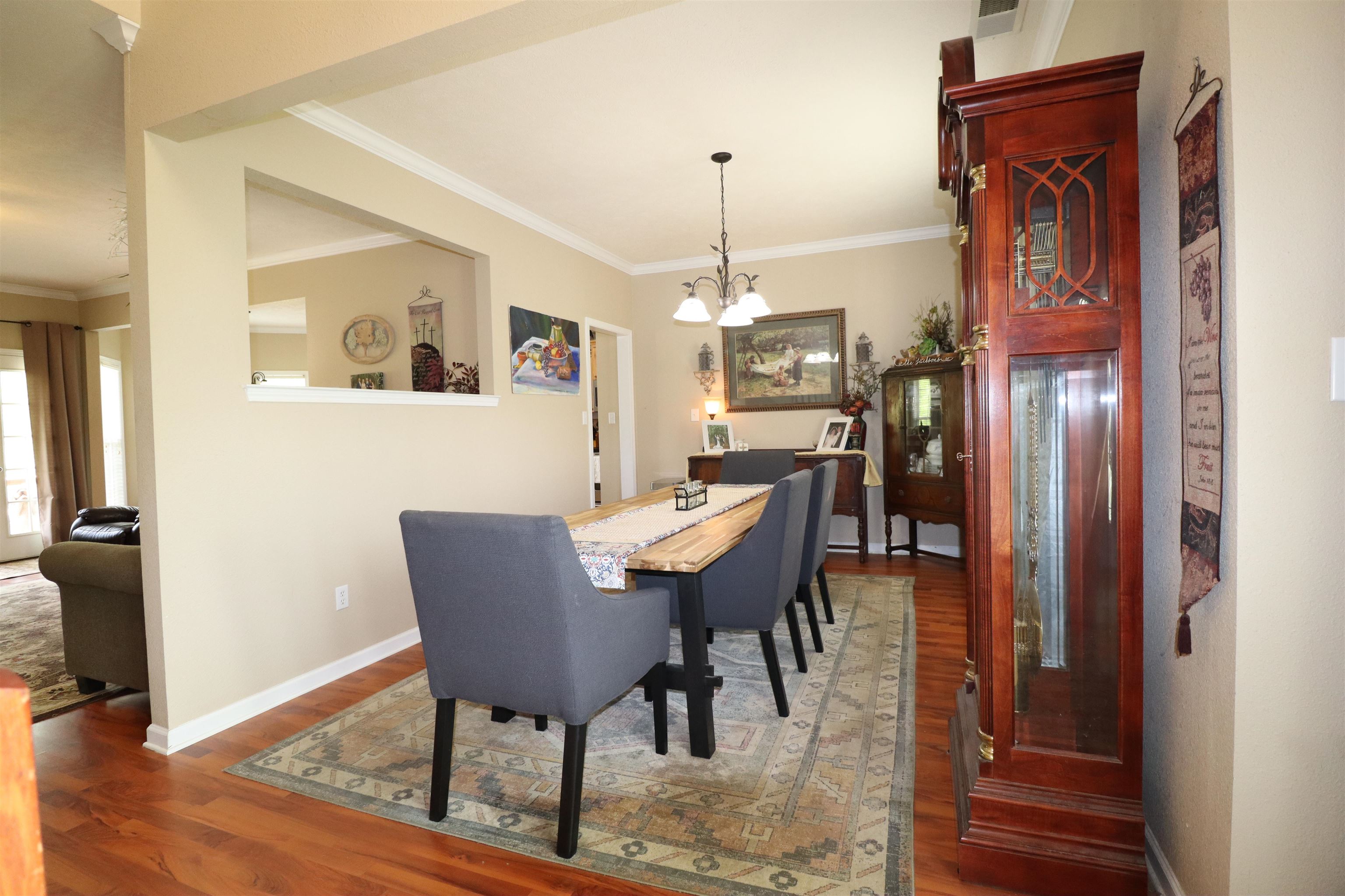 730 Durhamville Road Ripley, TN 38063 - Photo 3 of 40 a view of a dining room with furniture and wooden floor