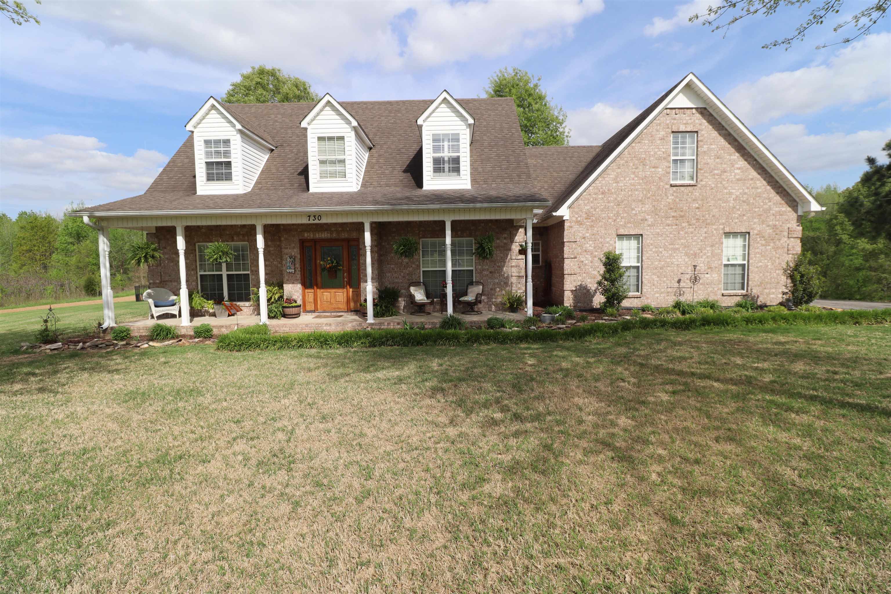 730 Durhamville Road Ripley, TN 38063 - Photo 33 of 40 front view of a house with a yard