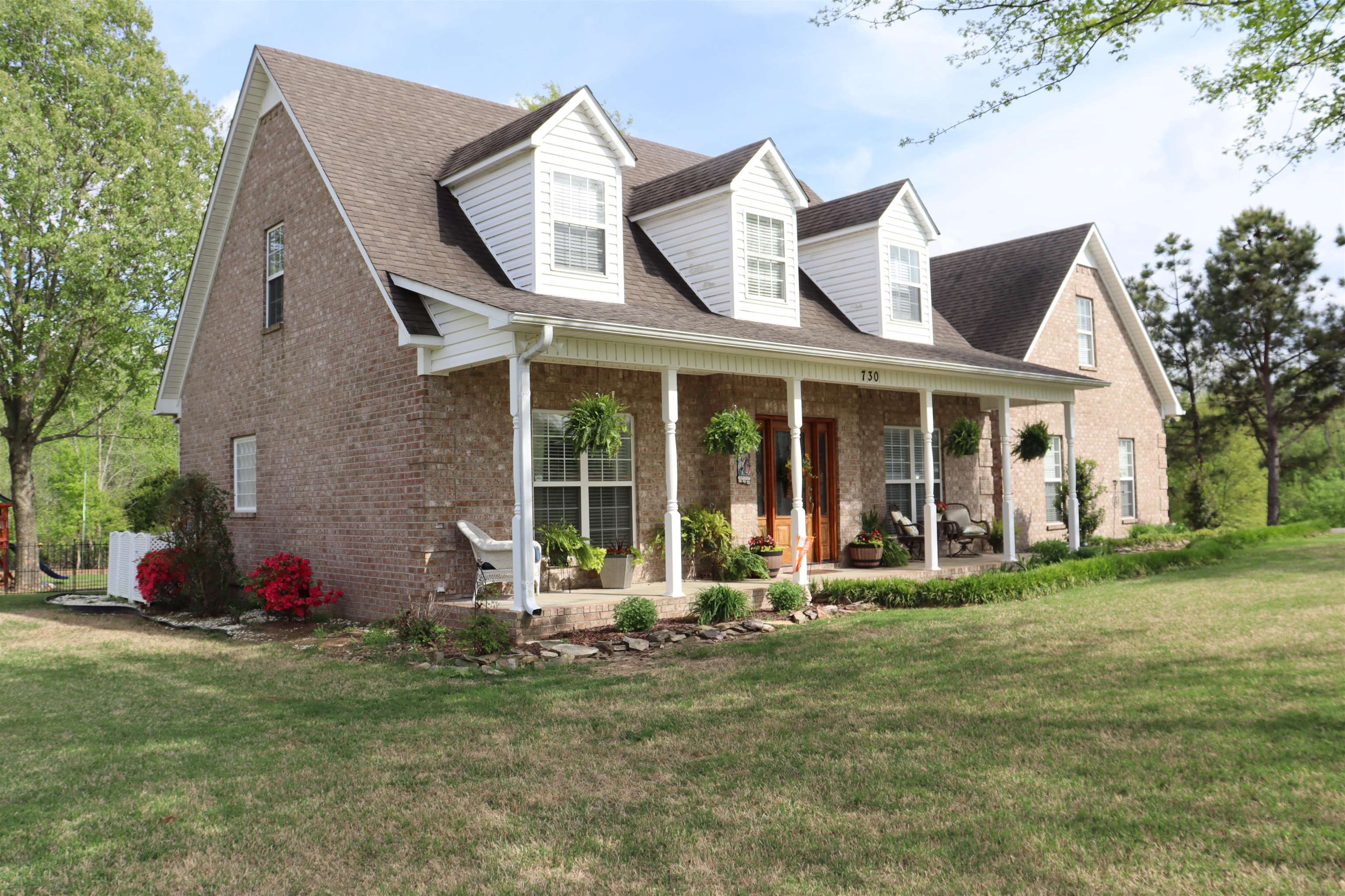 730 Durhamville Road Ripley, TN 38063 - Photo 34 of 40 a front view of a house with garden