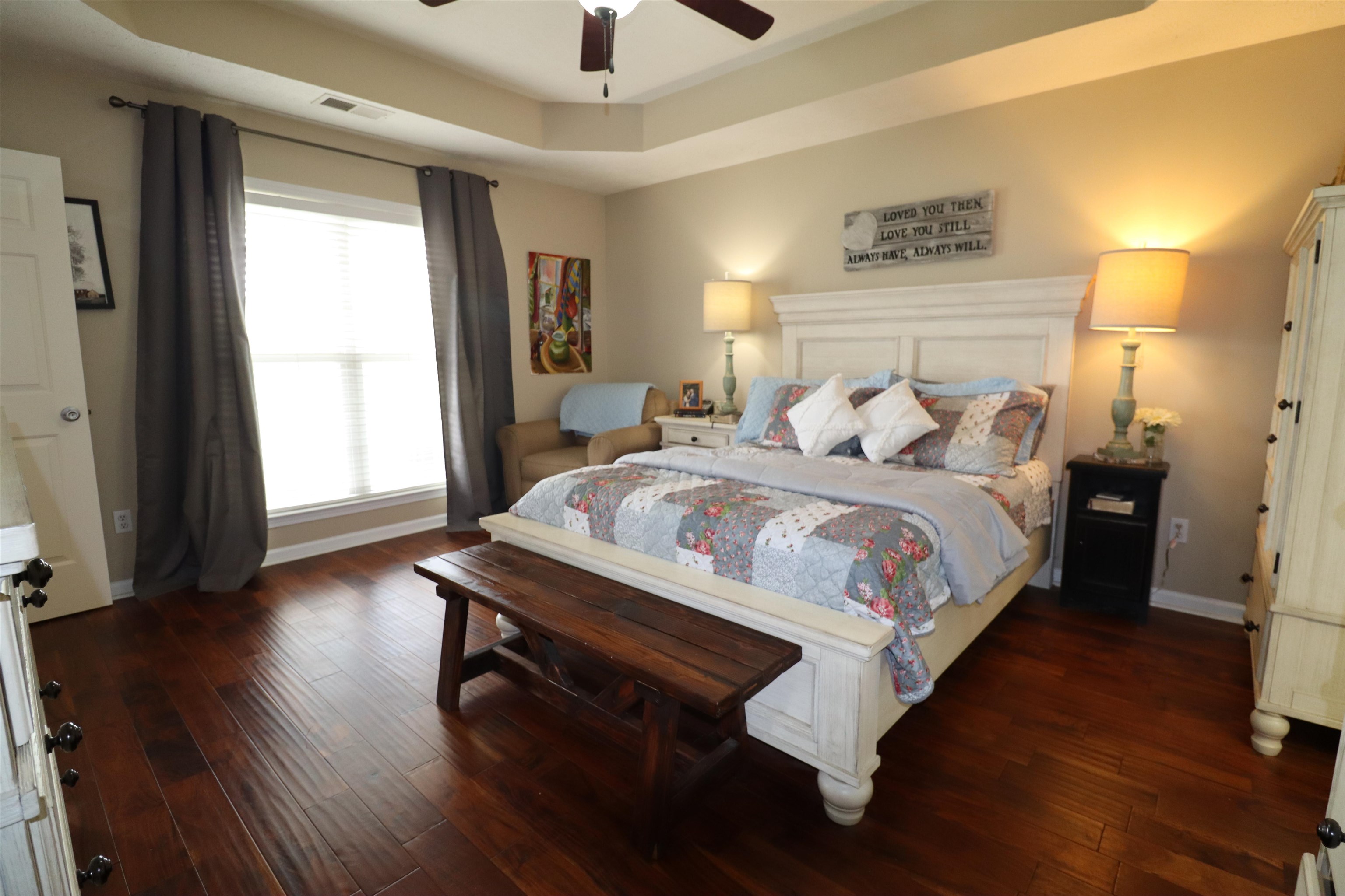 730 Durhamville Road Ripley, TN 38063 - Photo 6 of 40 a bedroom with bed and wooden floor