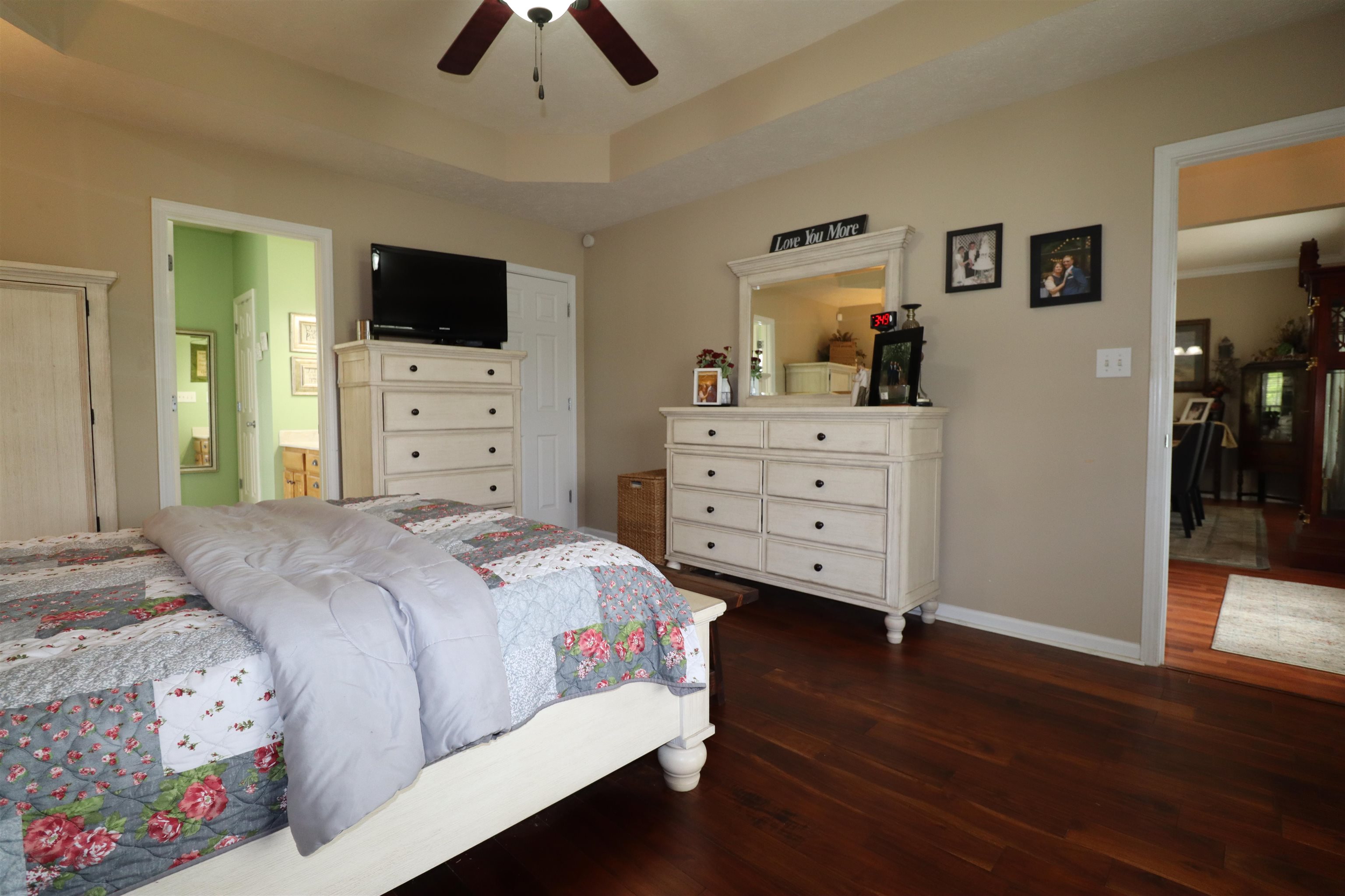 730 Durhamville Road Ripley, TN 38063 - Photo 7 of 40 a bedroom with a bed and wooden floor