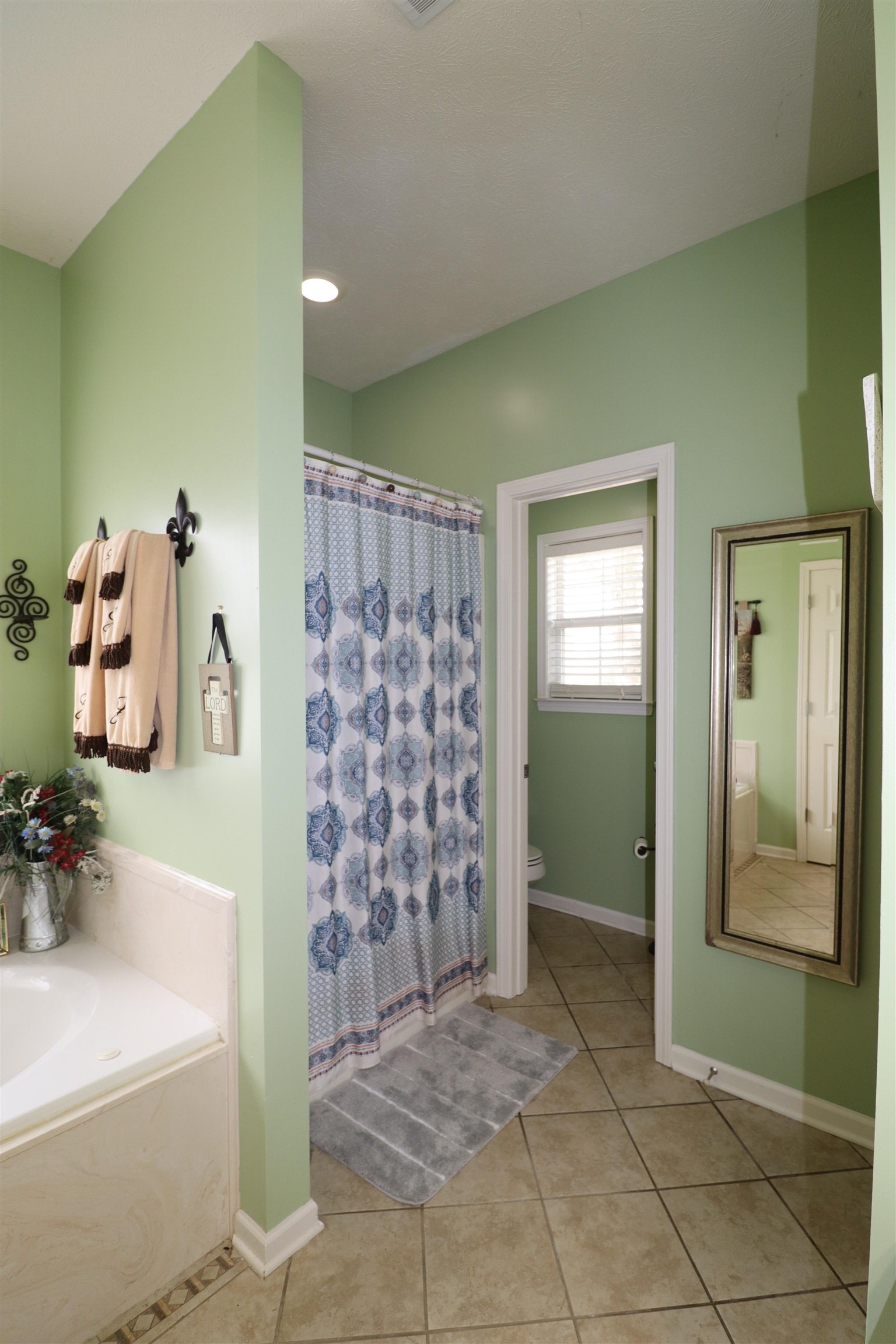 730 Durhamville Road Ripley, TN 38063 - Photo 10 of 40 a bathroom with a sink a toilet and shower