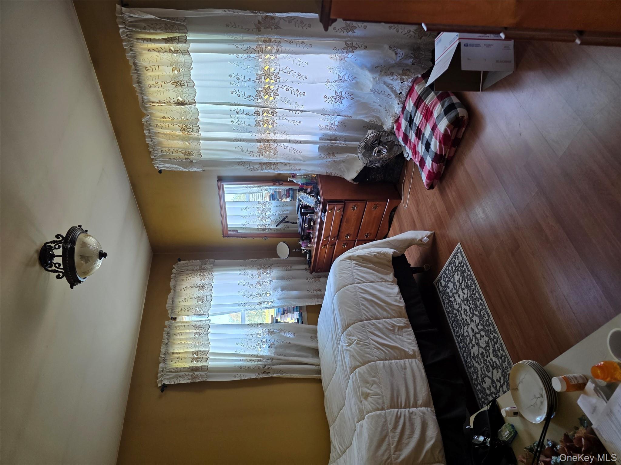 9 Queen Mountain Road, Unit 64 Ferndale, NY 12734 - Photo 14 of 20 a bedroom with bed couch and window
