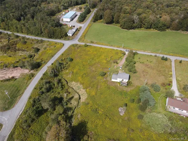 a view of a swimming pool and an outdoor space
