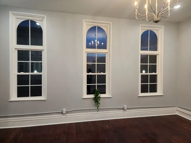 a view of windows and chandelier