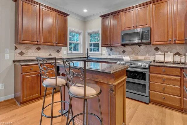 $602,500 | 1106 Appaloosa Court, Summerfield, NC 27358