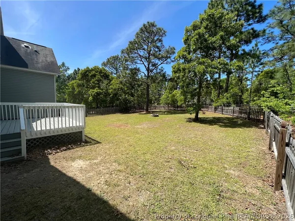 a view of a patio with a yard