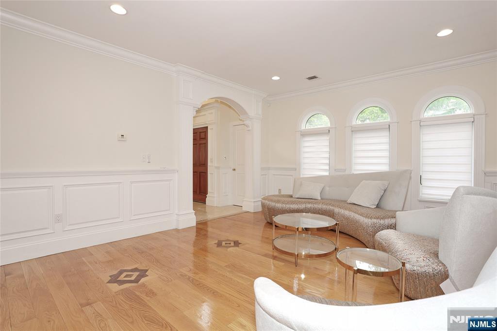 65 Ross Avenue Demarest, NJ 07627 - Photo 9 of 48 a living room with furniture and a large window