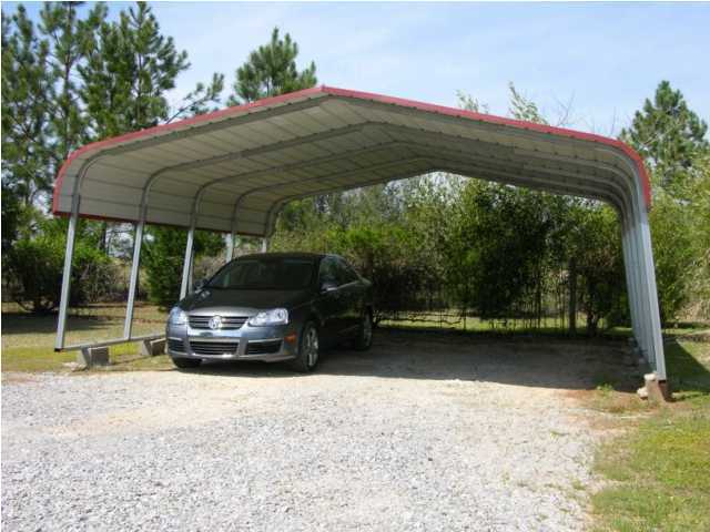5865 Bush Road Baker, FL 32531 - Photo 24 of 32 a car parked in front of a house