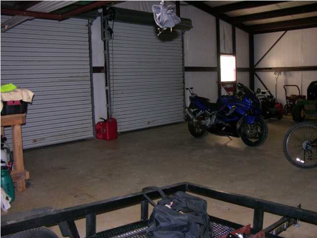 5865 Bush Road Baker, FL 32531 - Photo 28 of 32 a view of a room with gym equipment