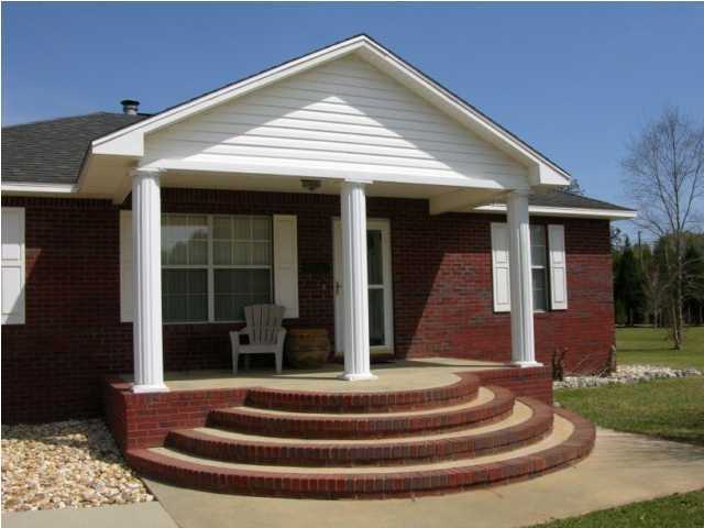 5865 Bush Road Baker, FL 32531 - Photo 5 of 32 a front view of a house