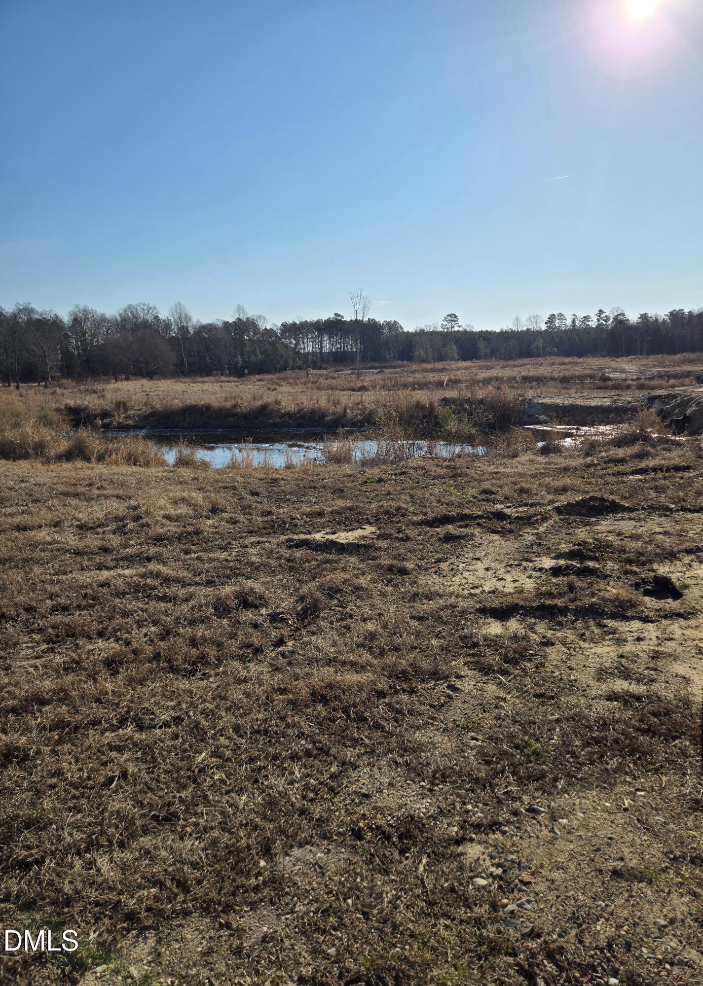 0 Mamie Upchurch Road Lillington, NC 27546 - Photo 2 of 13 a view of lake with sunset