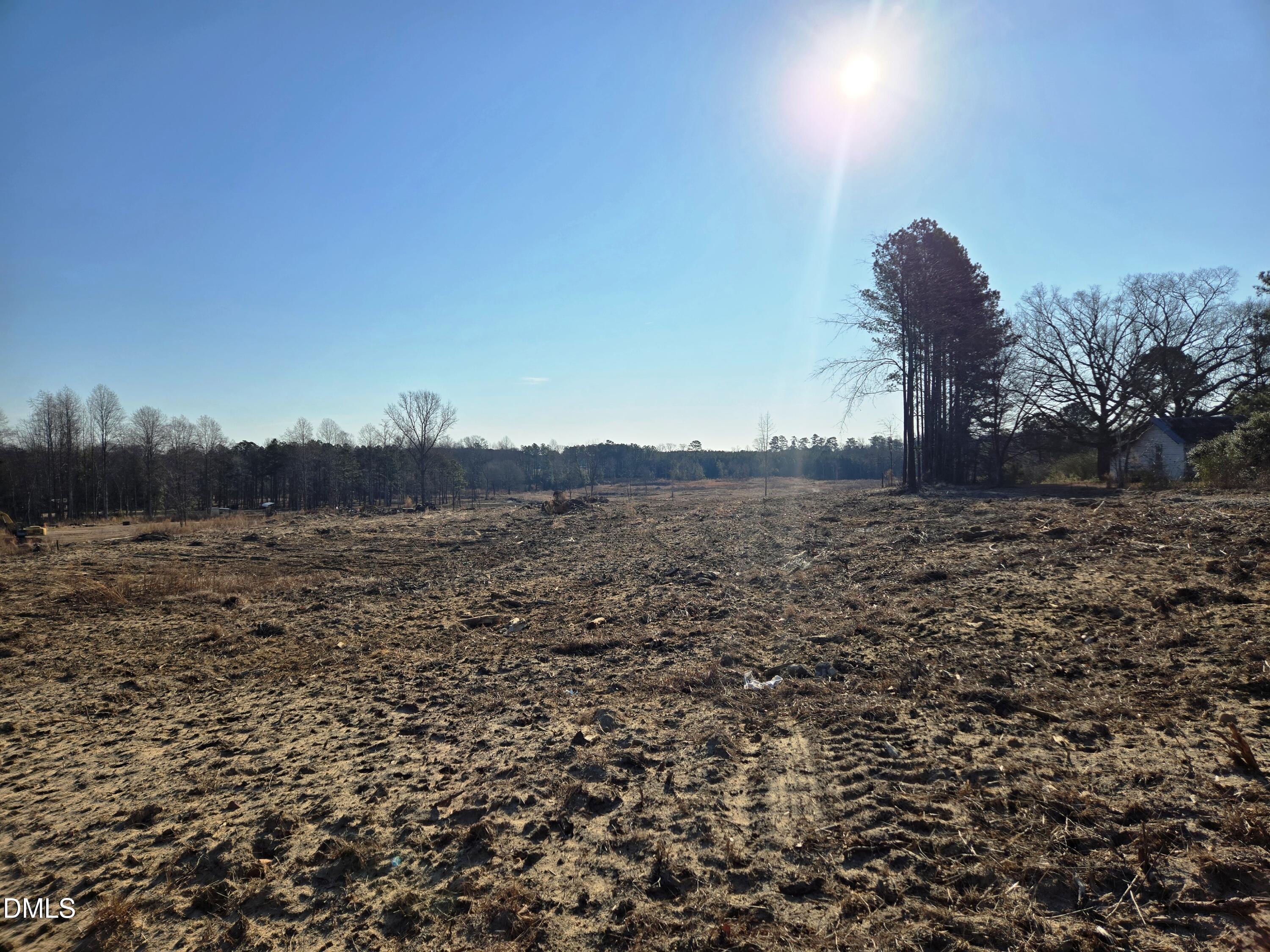 0 Mamie Upchurch Road Lillington, NC 27546 - Photo 3 of 13 a view of a dry yard with wooden fence