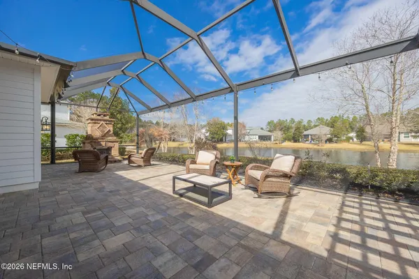 a kitchen with a sink stainless steel appliances and cabinets
