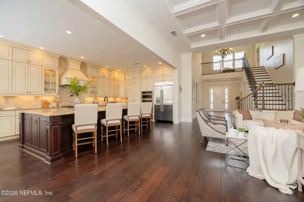 a view of a patio with a table chairs and a table