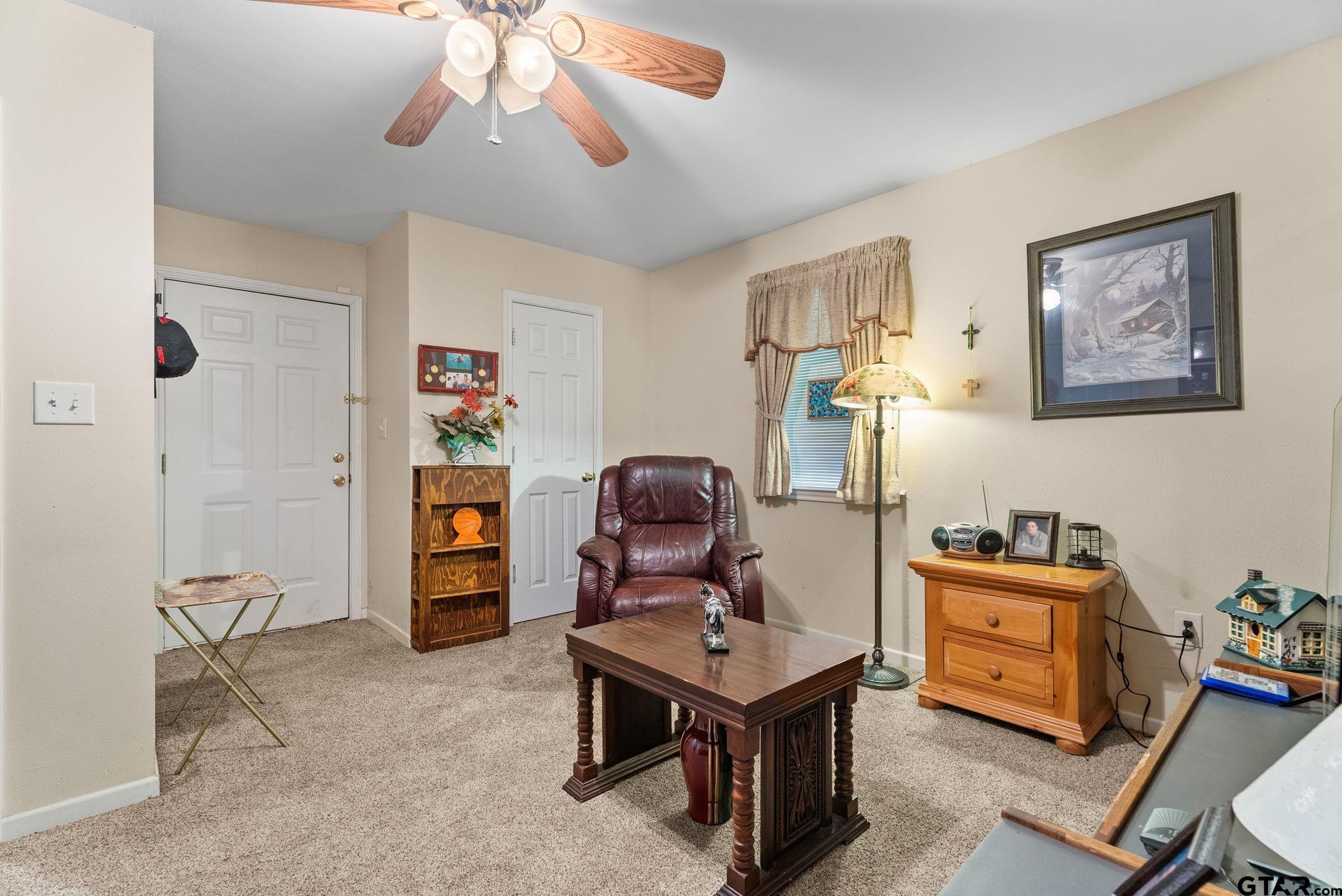 203 Pecan Street Rusk, TX 75785 - Photo 21 of 35 a room with furniture and wooden floor