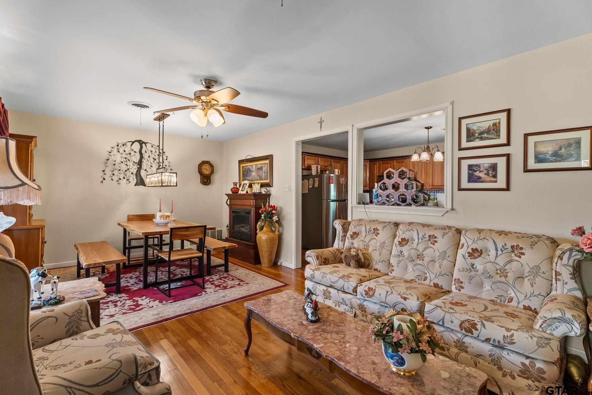 203 Pecan Street Rusk, TX 75785 - Photo 3 of 35 a living room with furniture and wooden floor