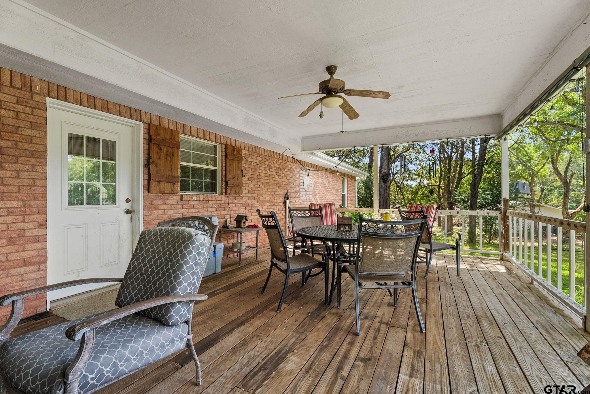 203 Pecan Street Rusk, TX 75785 - Photo 32 of 35 a view of a dining room with furniture window and wooden floor