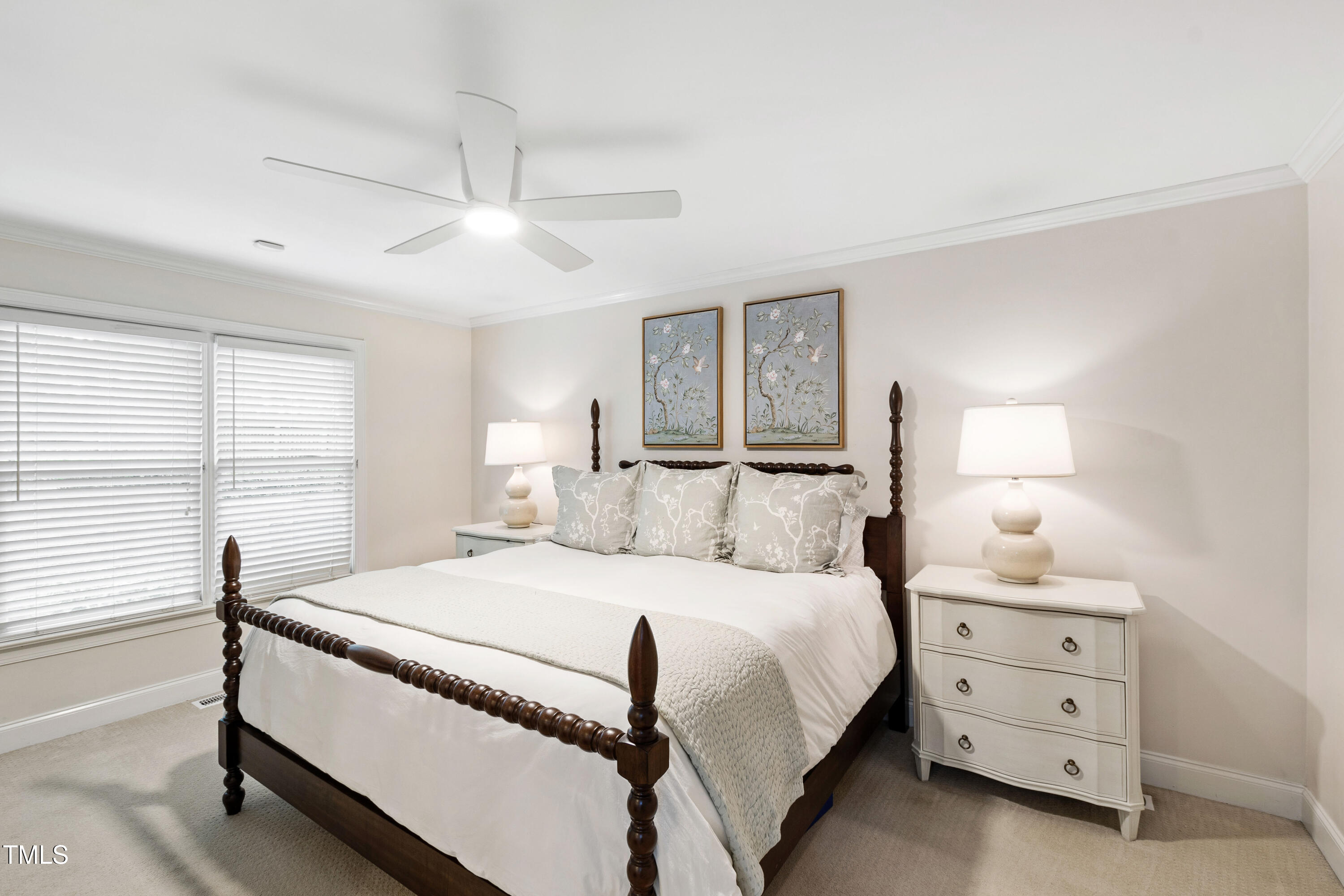 2415 Van Dyke Avenue Raleigh, NC 27607 - Photo 12 of 24 a bedroom with a bed and a window
