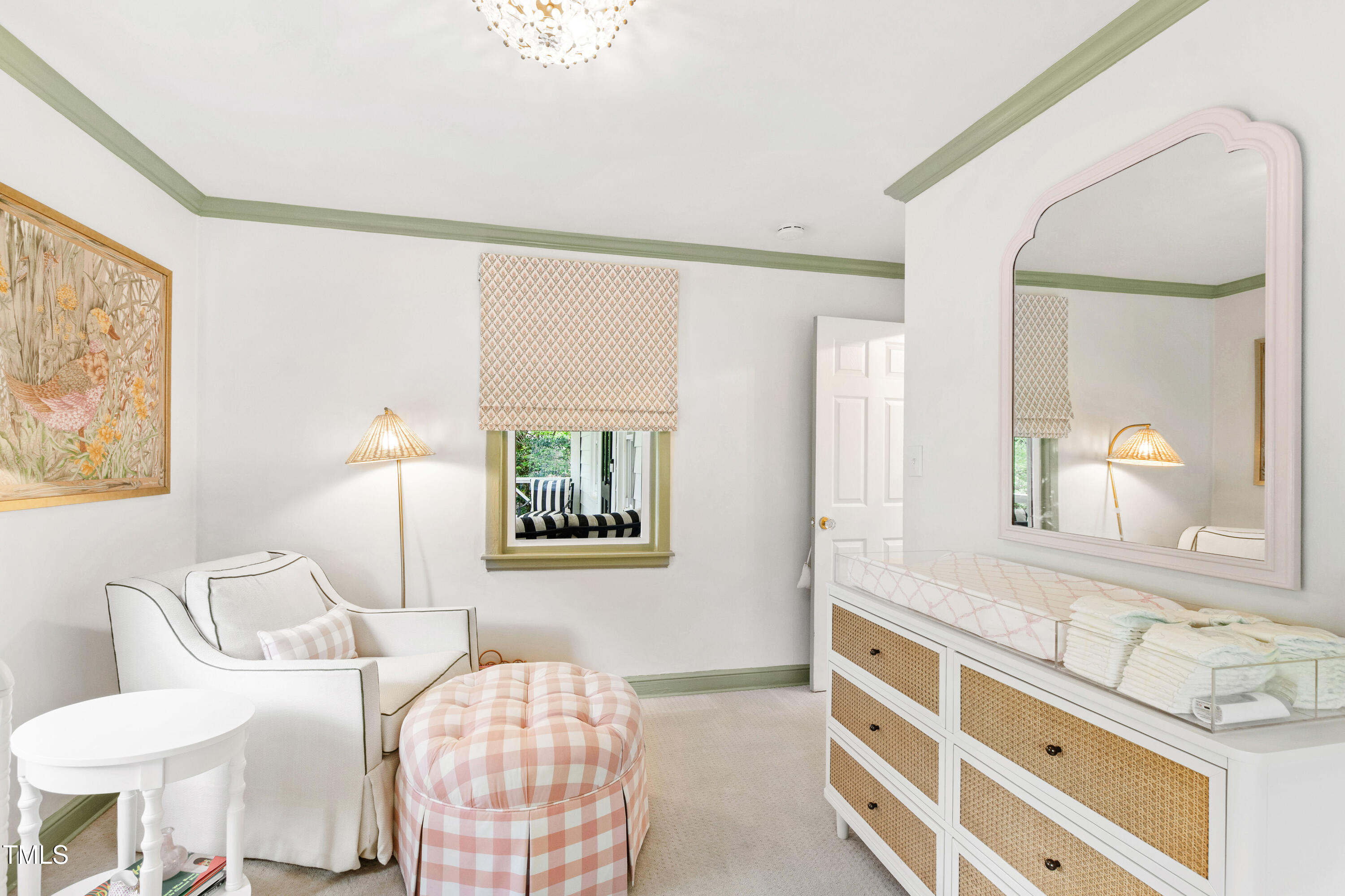 2415 Van Dyke Avenue Raleigh, NC 27607 - Photo 16 of 24 a bedroom with a bed and a dresser