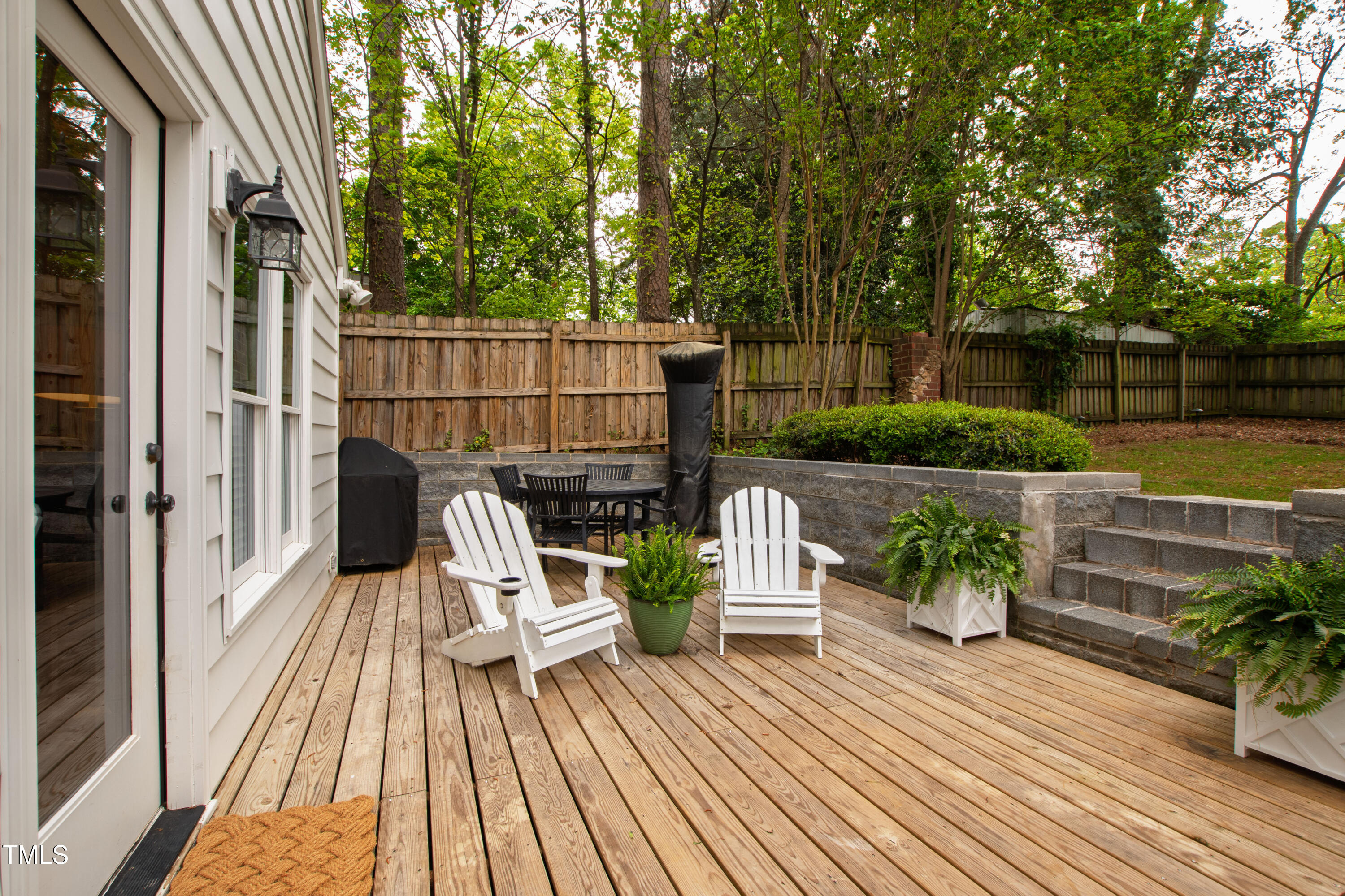 2415 Van Dyke Avenue Raleigh, NC 27607 - Photo 20 of 24 a view of a chairs on deck with wooden floor