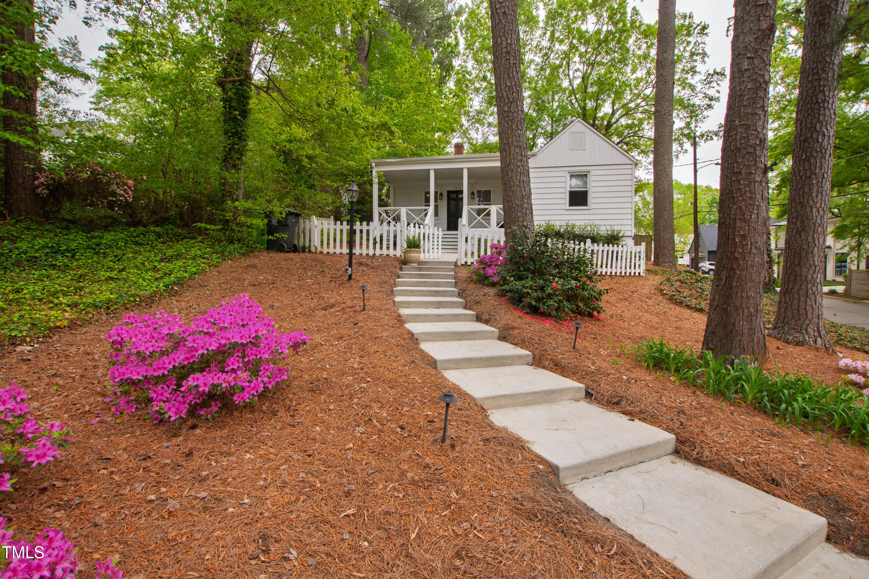 2415 Van Dyke Avenue Raleigh, NC 27607 - Photo 24 of 24 a view of a house with backyard and garden