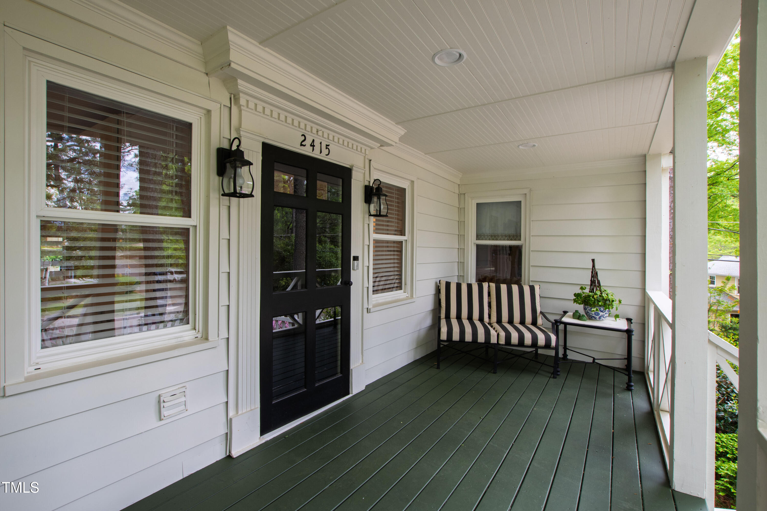 2415 Van Dyke Avenue Raleigh, NC 27607 - Photo 3 of 24 a view of a balcony with a couch