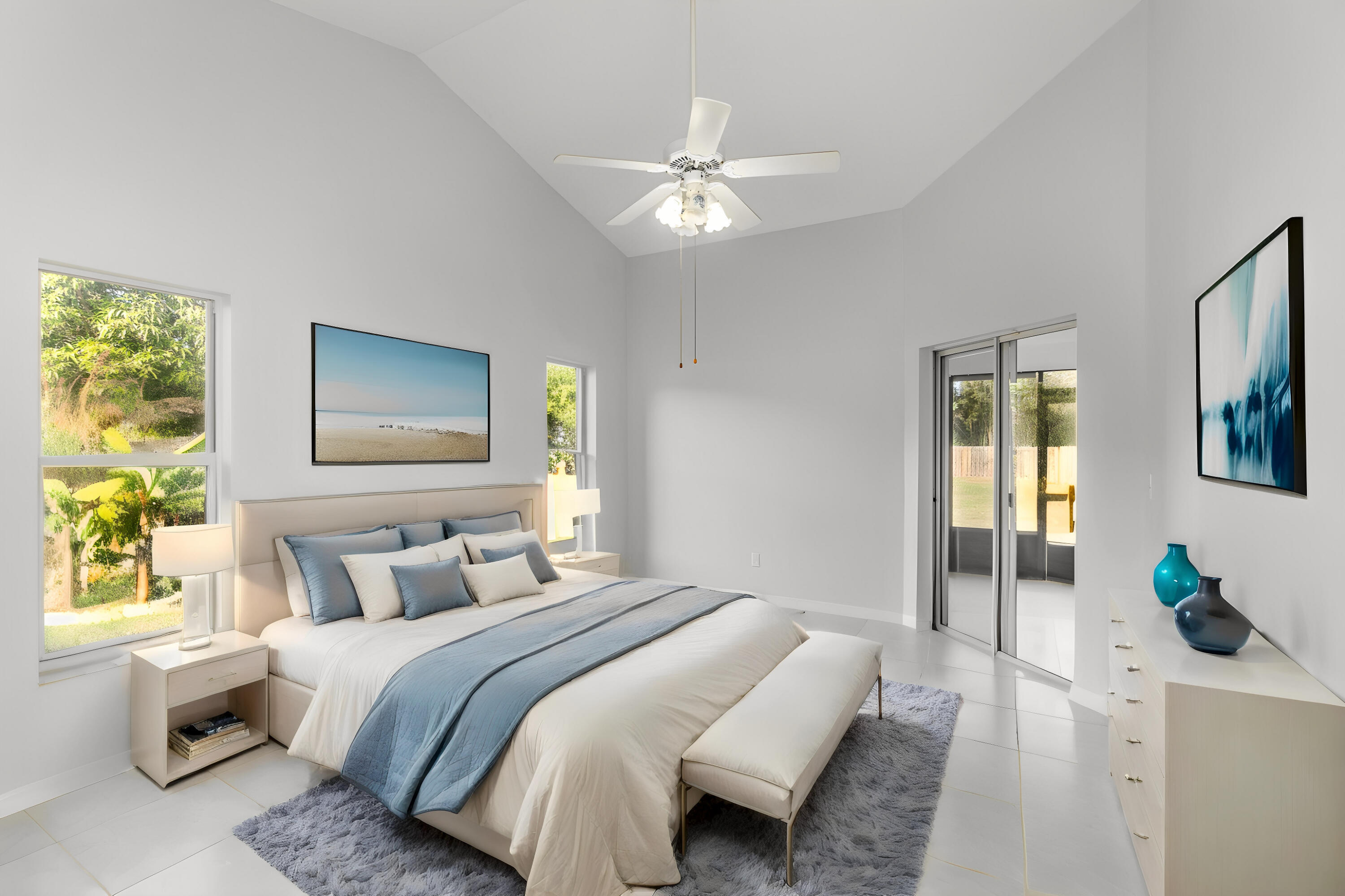 4655 Willow Bend Drive Melbourne, FL 32935 - Photo 13 of 27 a bedroom with a bed and a chandelier