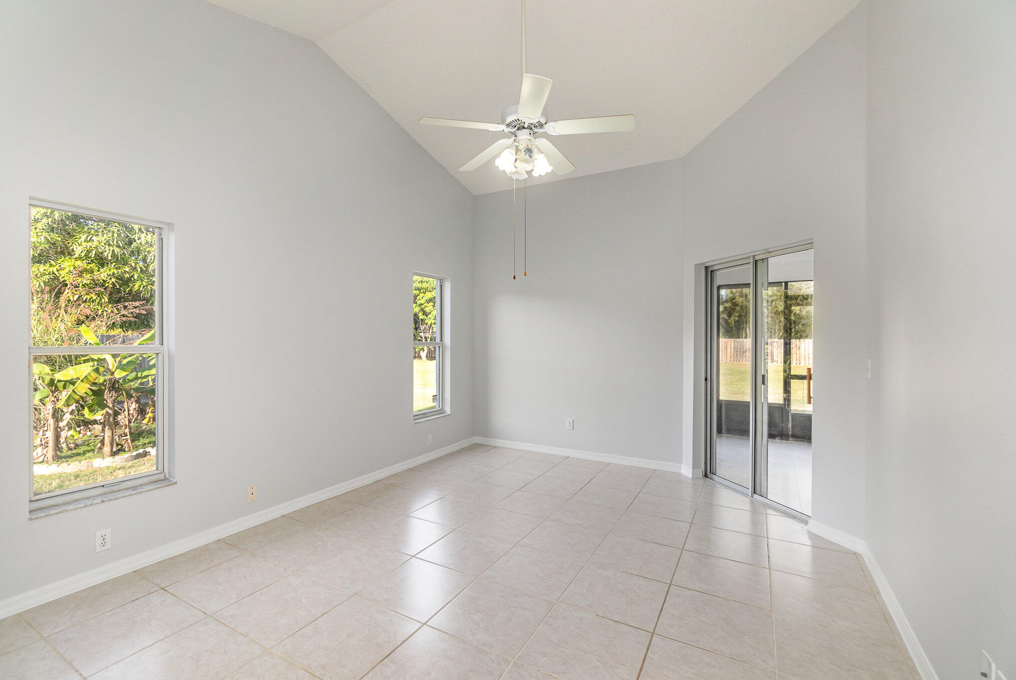 4655 Willow Bend Drive Melbourne, FL 32935 - Photo 14 of 27 a view of an empty room with a window
