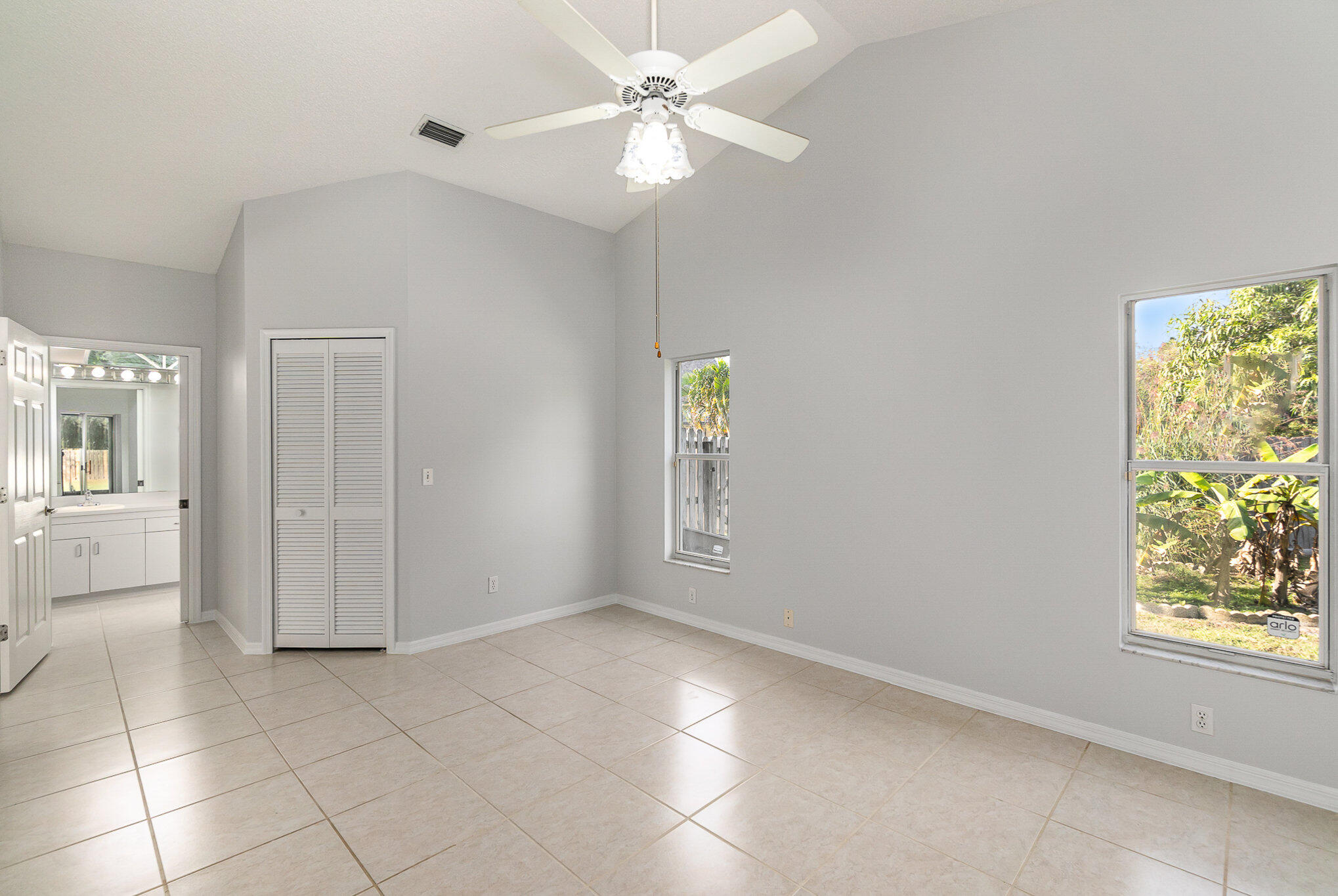 4655 Willow Bend Drive Melbourne, FL 32935 - Photo 17 of 27 a view of an empty room with a window