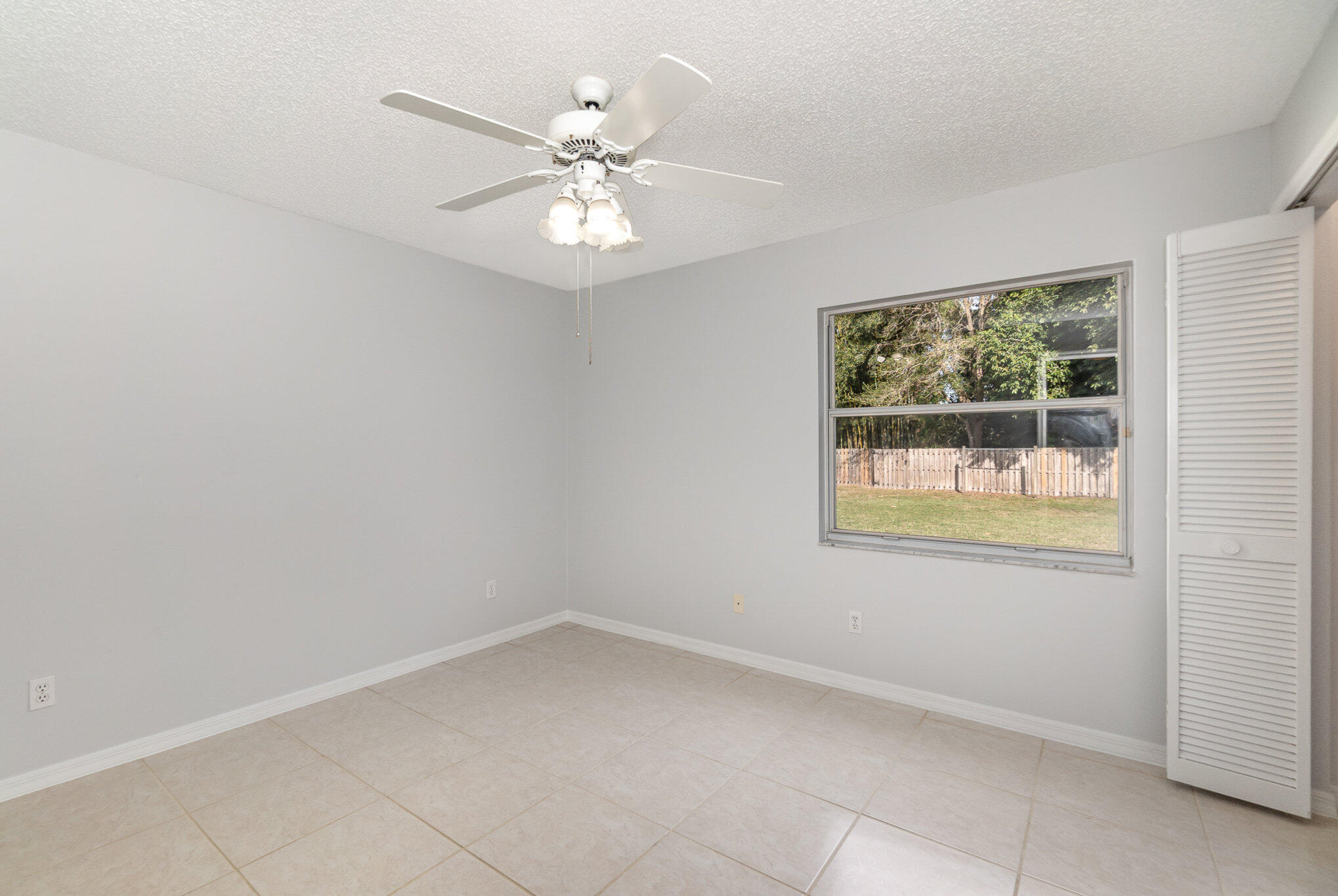 4655 Willow Bend Drive Melbourne, FL 32935 - Photo 20 of 27 an empty room with a window