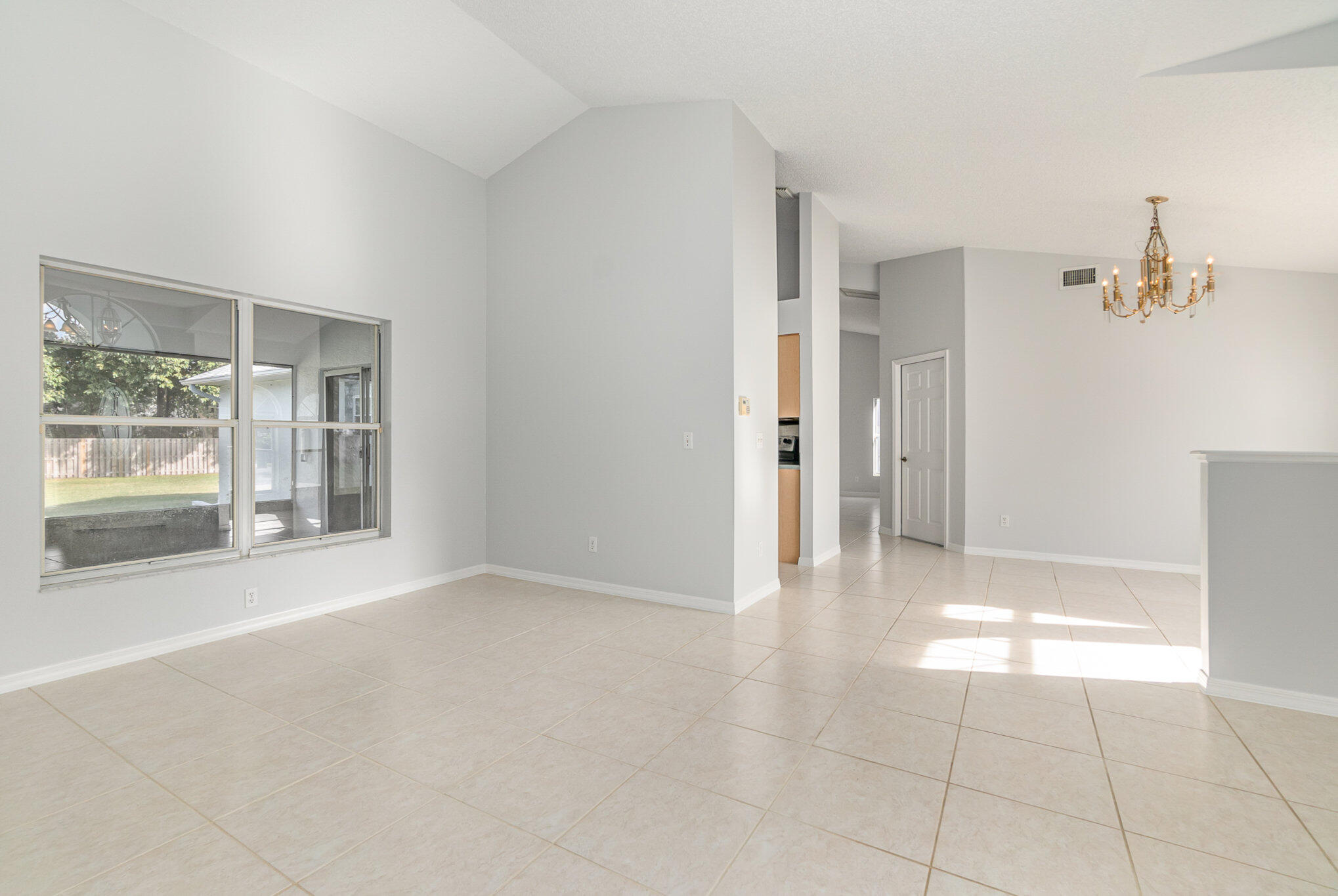 4655 Willow Bend Drive Melbourne, FL 32935 - Photo 5 of 27 a view of an empty room with a window