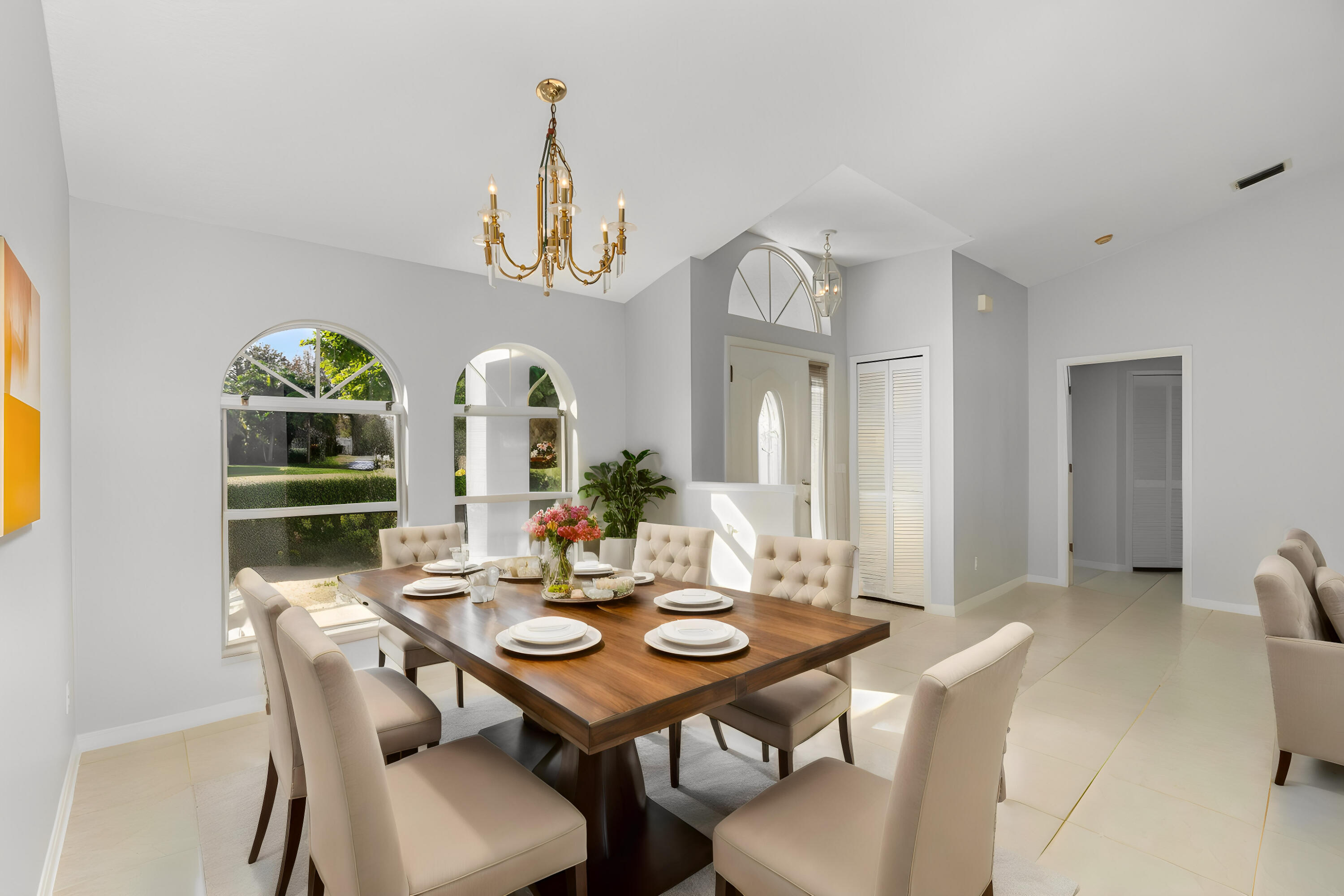 4655 Willow Bend Drive Melbourne, FL 32935 - Photo 6 of 27 a view of a dining room with furniture window and wooden floor