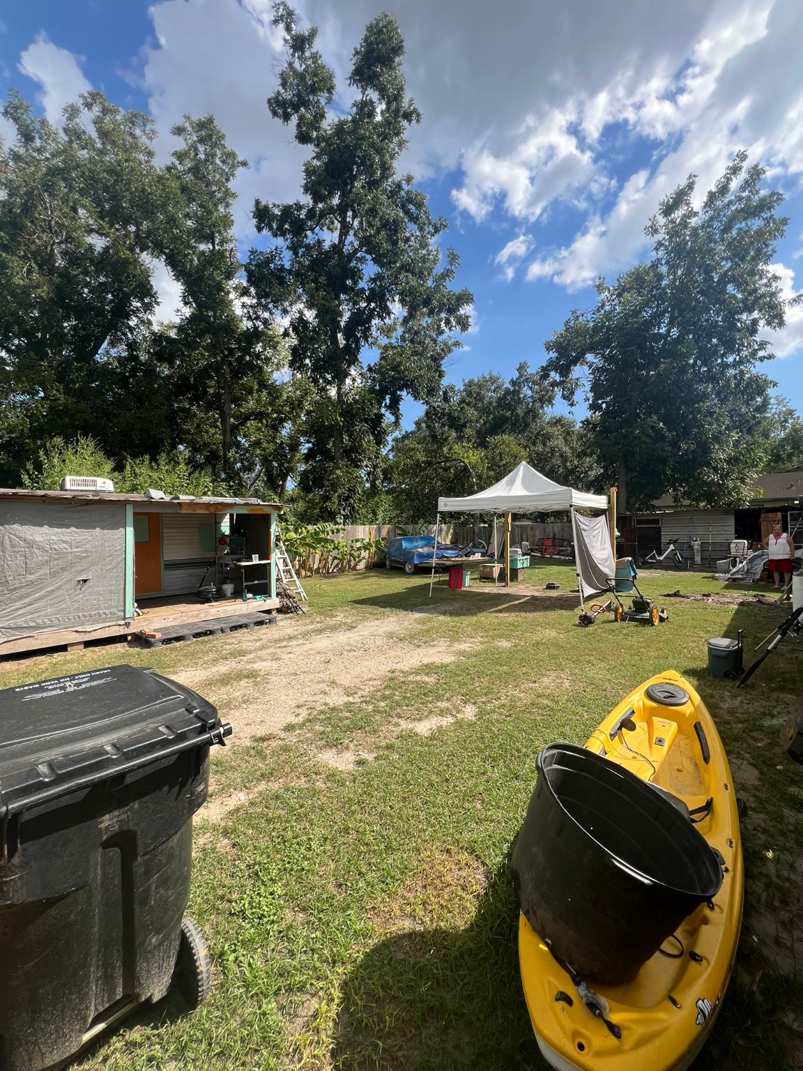 0 Freeland Street Houston, TX 77075 - Photo 2 of 2 a view of a swimming pool with lawn chairs under an umbrella