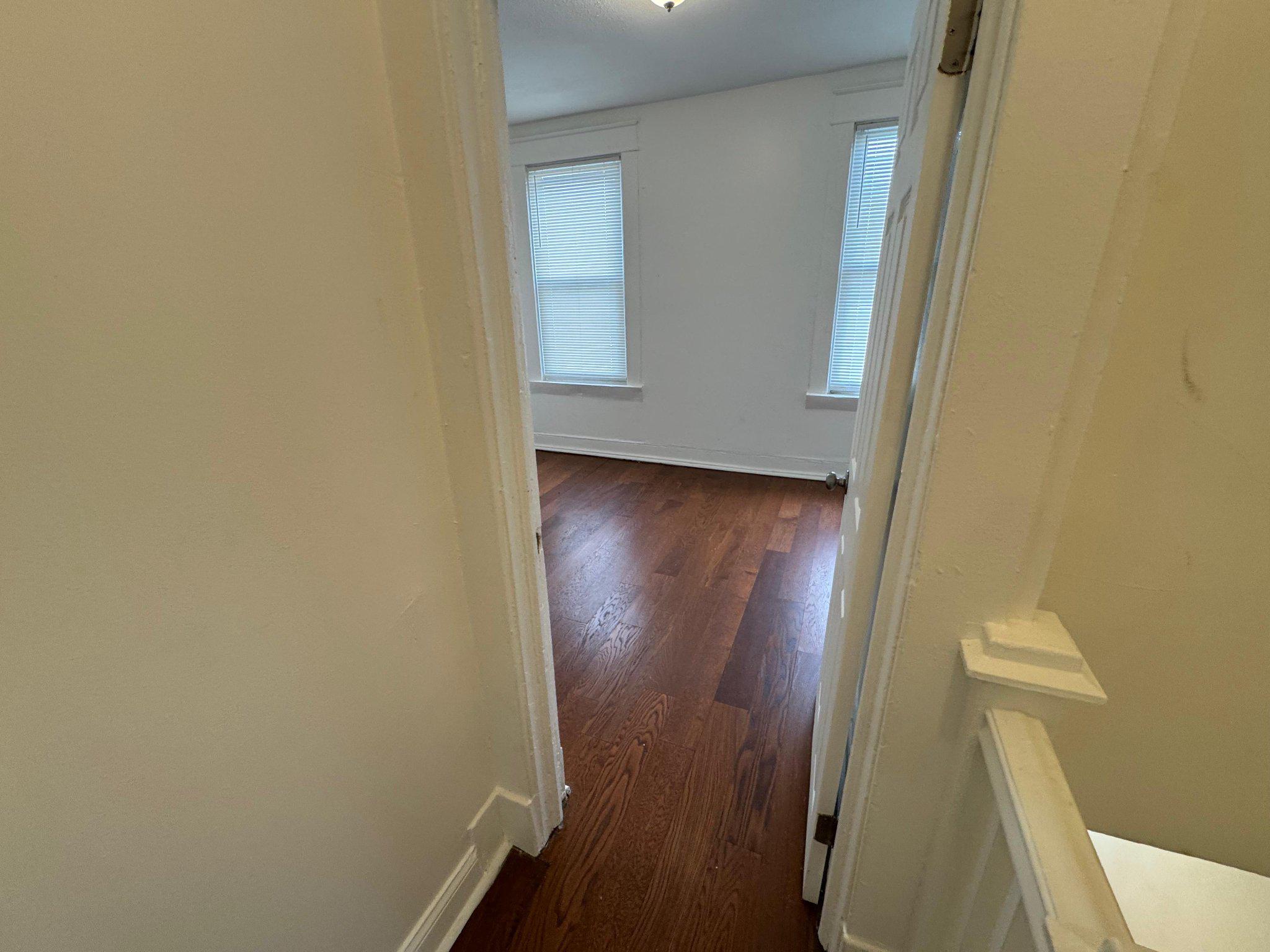 707 Denison Street Baltimore, MD 21229 - Photo 17 of 18 Bd3 Bright and inviting hallway view.