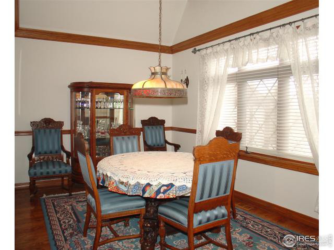 5575 St Vrain Road Longmont, CO 80503 - Photo 5 of 10 a view of a dining room with furniture and window