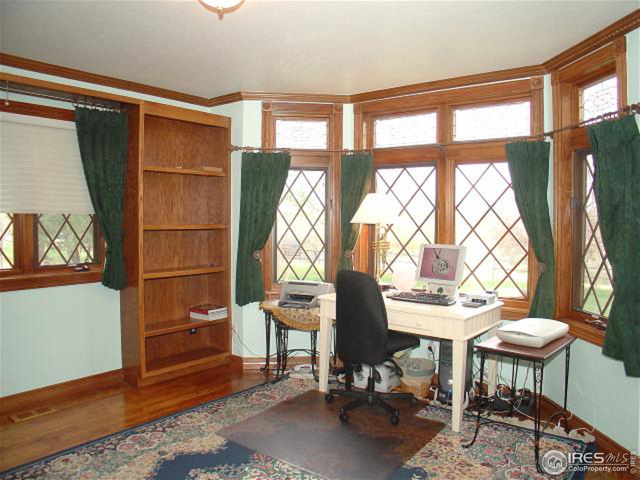 5575 St Vrain Road Longmont, CO 80503 - Photo 10 of 10 a view of a livingroom with furniture and a window