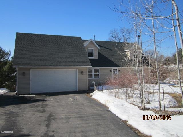 6 Snipe Hollow Road Elizabeth, IL 61028 - Photo 1 of 23 a backyard of a house