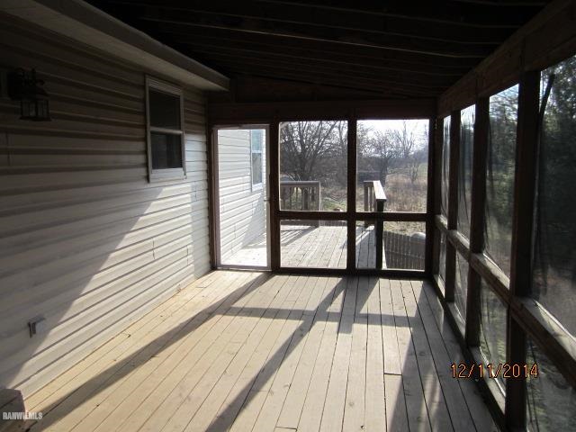 6 Snipe Hollow Road Elizabeth, IL 61028 - Photo 6 of 23 a view of a balcony with wooden floor