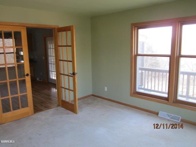 6 Snipe Hollow Road Elizabeth, IL 61028 - Photo 7 of 23 an empty room with windows