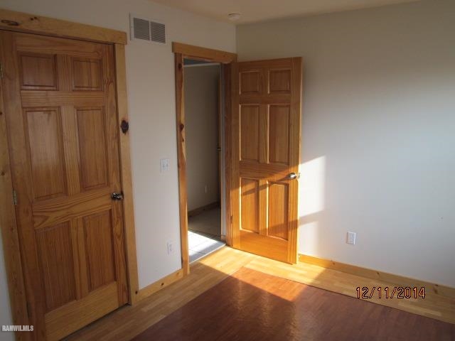 6 Snipe Hollow Road Elizabeth, IL 61028 - Photo 10 of 23 an empty room with windows