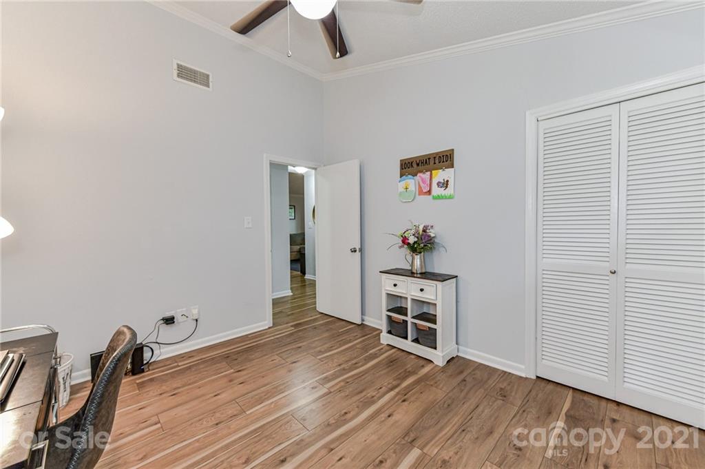 1706 Carson Street Monroe, NC 28110 - Photo 25 of 36 a view of a livingroom with wooden floor and furniture