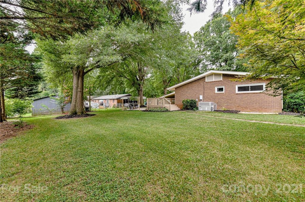 1706 Carson Street Monroe, NC 28110 - Photo 33 of 36 a front view of house with yard and green space