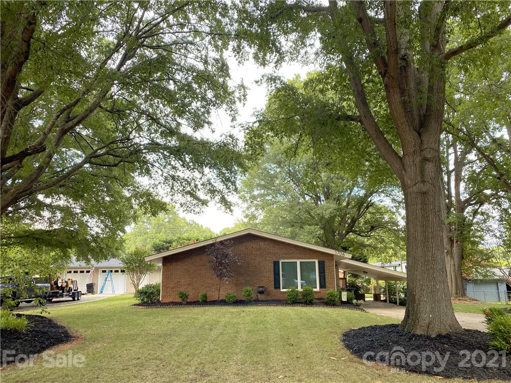 1706 Carson Street Monroe, NC 28110 - Photo 35 of 36 a house view with a garden space