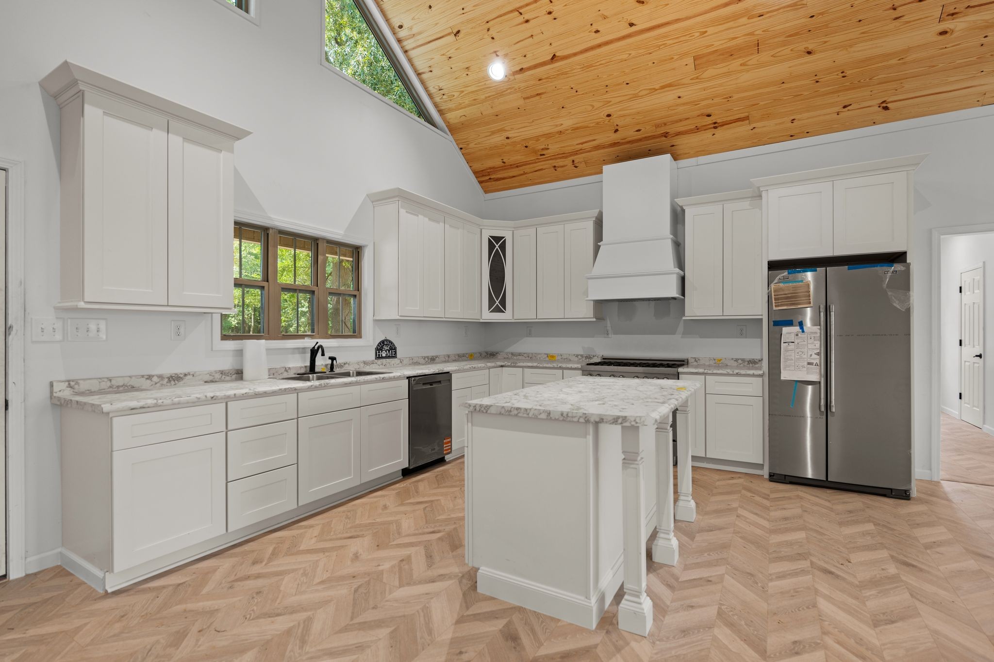 324 Fisherdale Drive Decaturville, TN 38329 - Photo 18 of 36 a kitchen with a sink cabinets and window