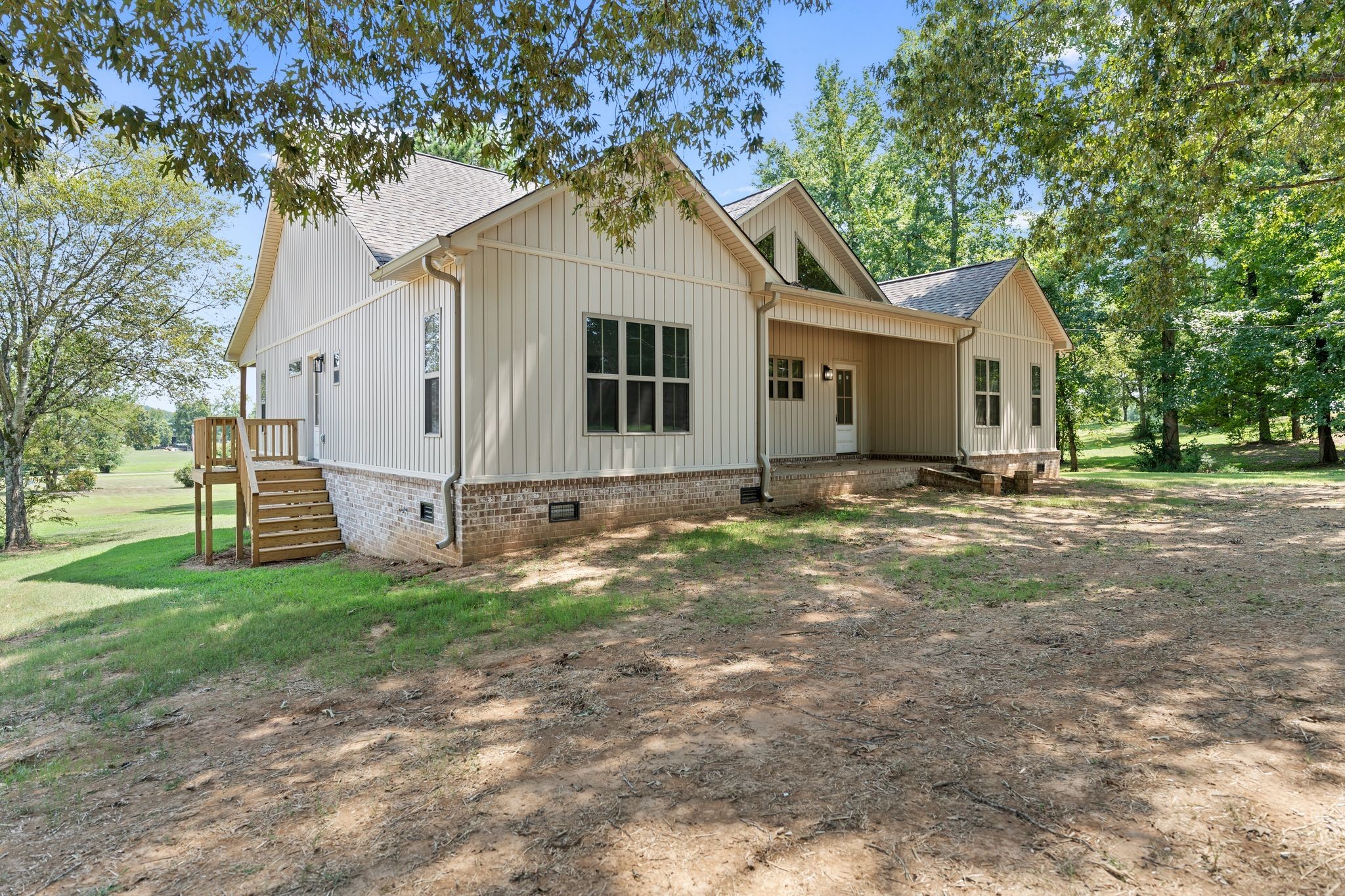 324 Fisherdale Drive Decaturville, TN 38329 - Photo 20 of 36 a front view of house with yard and green space
