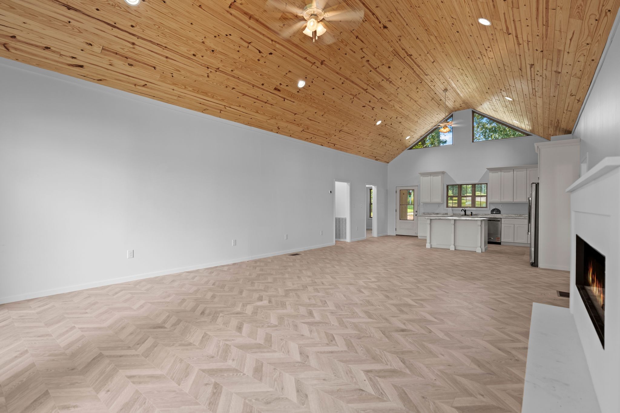 324 Fisherdale Drive Decaturville, TN 38329 - Photo 24 of 36 a big room with chandelier fan and windows